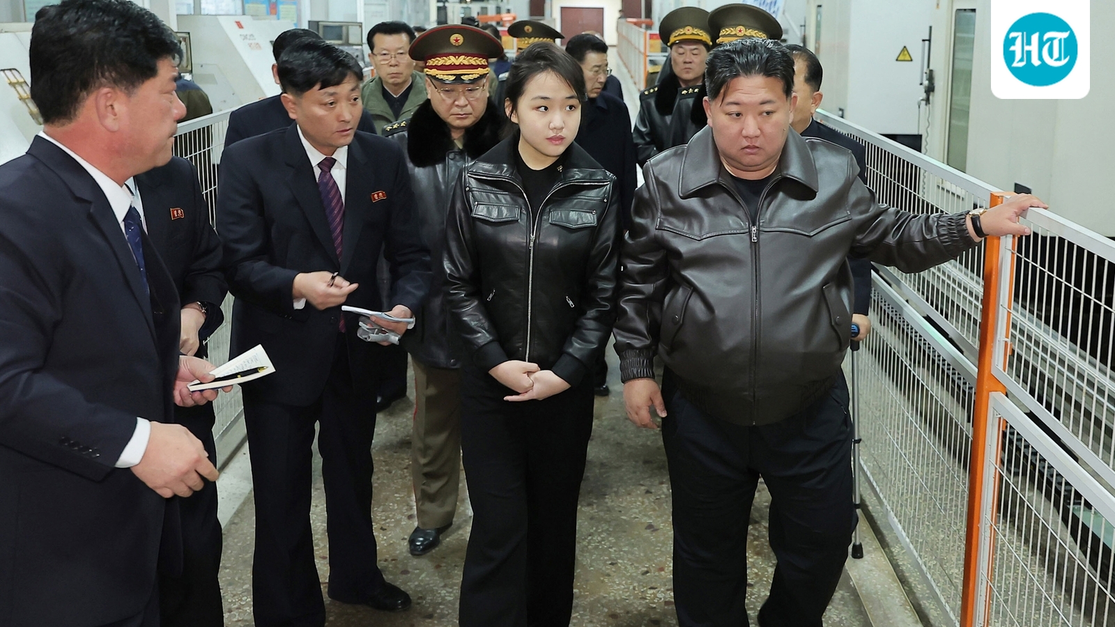 Kim Jong Un tests new pistols with daughter at shooting range in latest public appearance