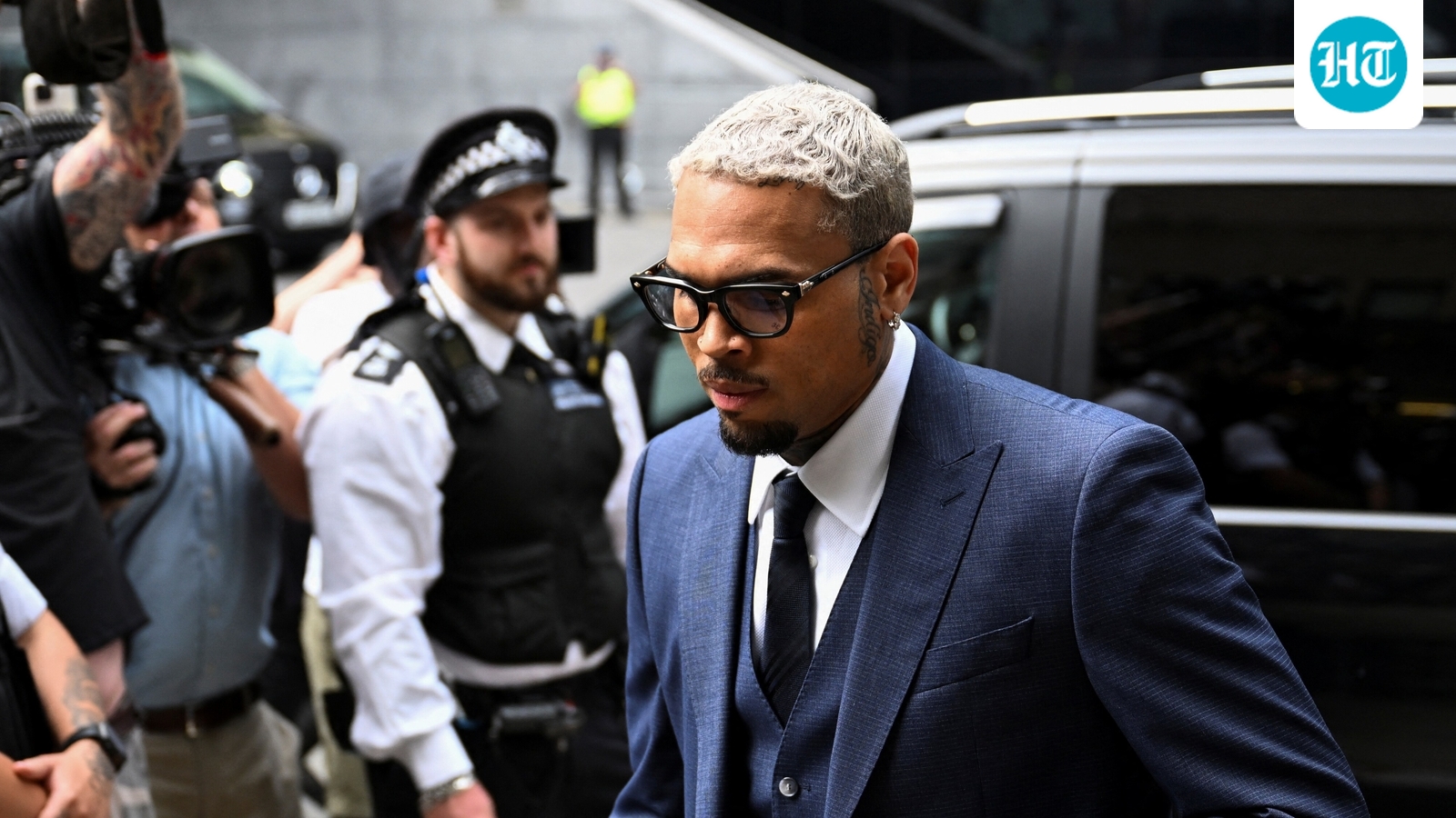 Chris Brown ordered to pay $13 million after housekeeper was mauled by his dog; singer allegedly fled the scene