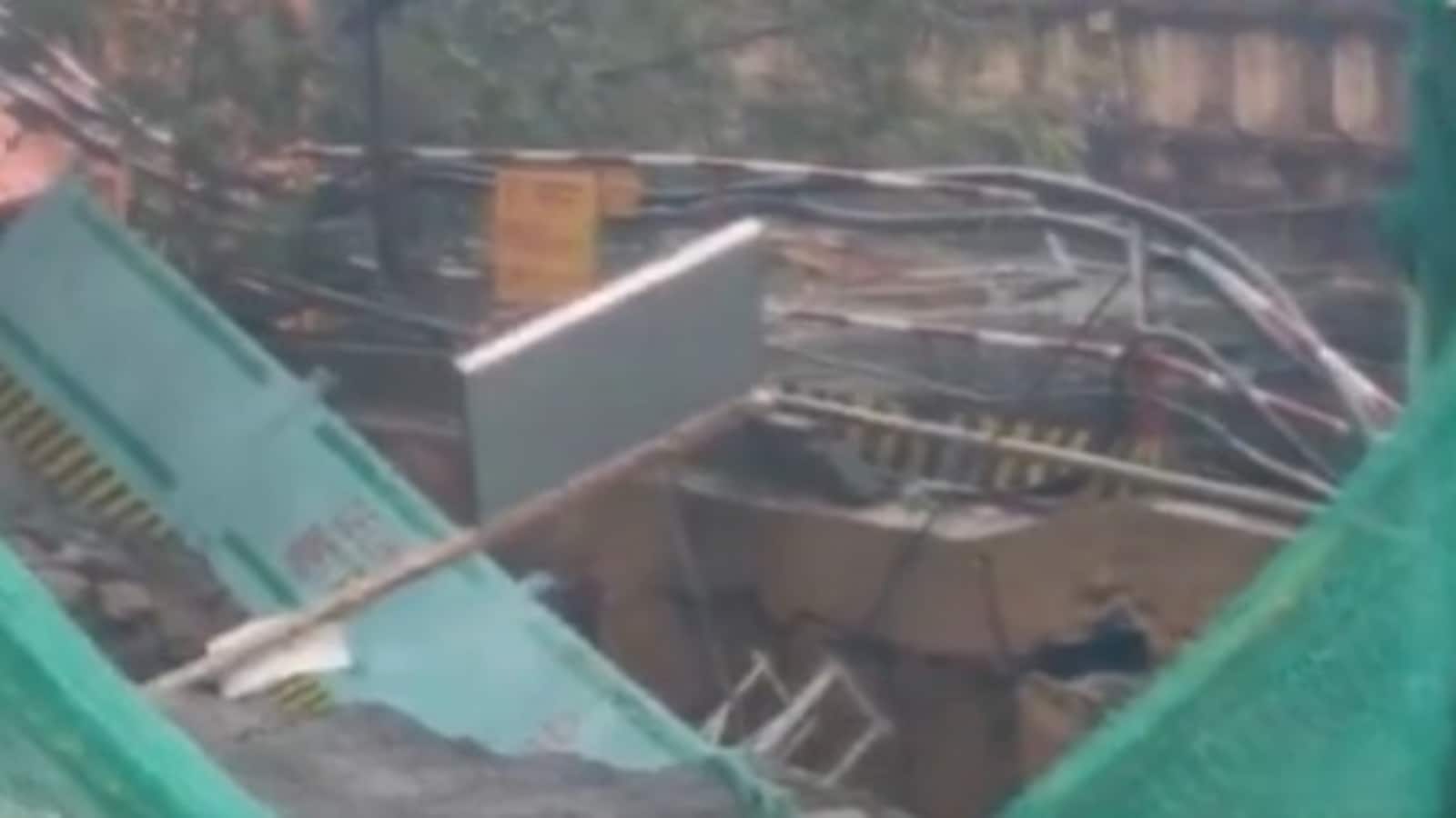 Road near Delhi flyover collapses after metro wall falls during heavy rain | Video