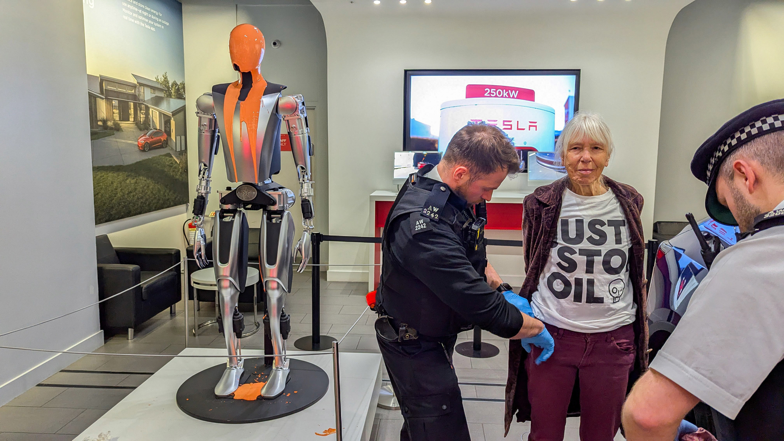 ‘Shut down the fascists’; Just Stop Oil protesters arrested after pouring paint over Tesla robot in London | Watch