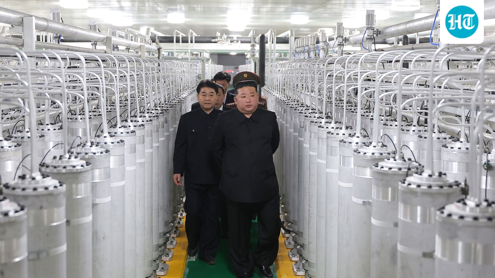 Kim Jong Un tours new nuclear site, says output capacity doubled