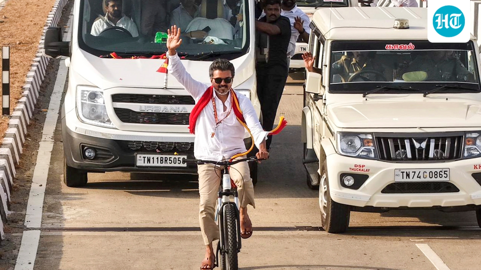 Internet finds new ‘meme template’ as cycling Vijay panics after fan throws petals at him; fans defend TVK chief