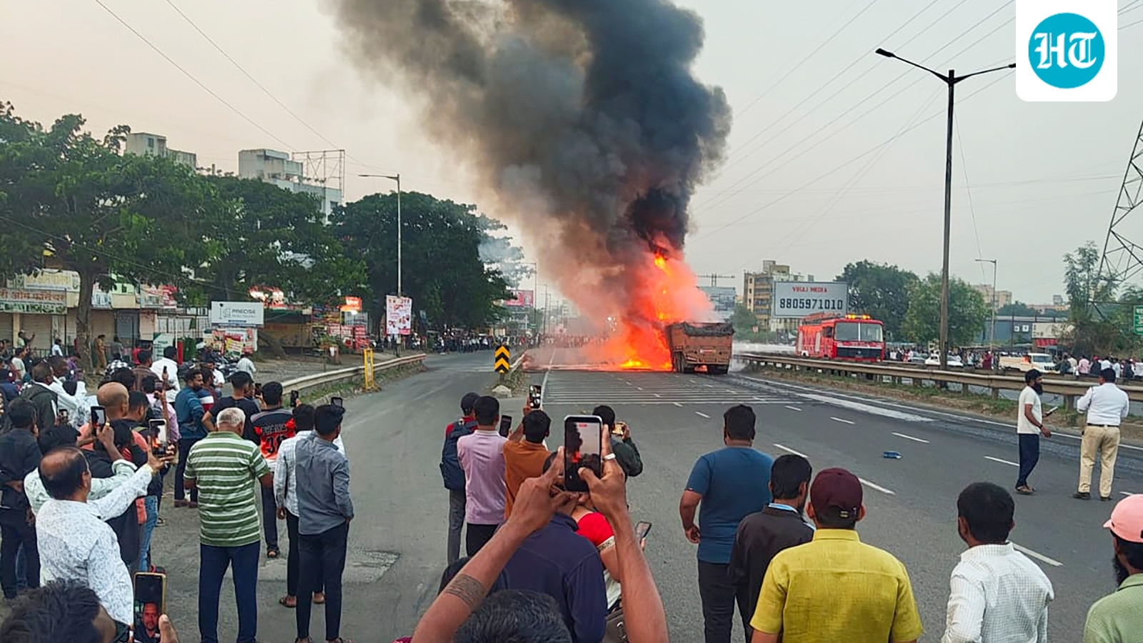 7 dead as car crushed between two container trucks in Pune highway fire