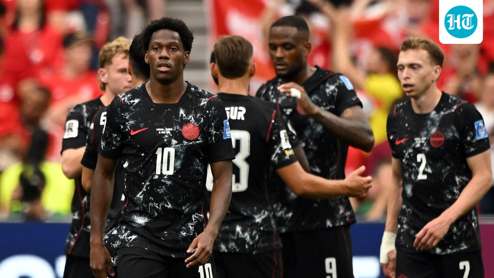 Canada annihilate 9-man Qatar 6-0 for first World Cup win; Switzerland thrash Bosnia 4-1