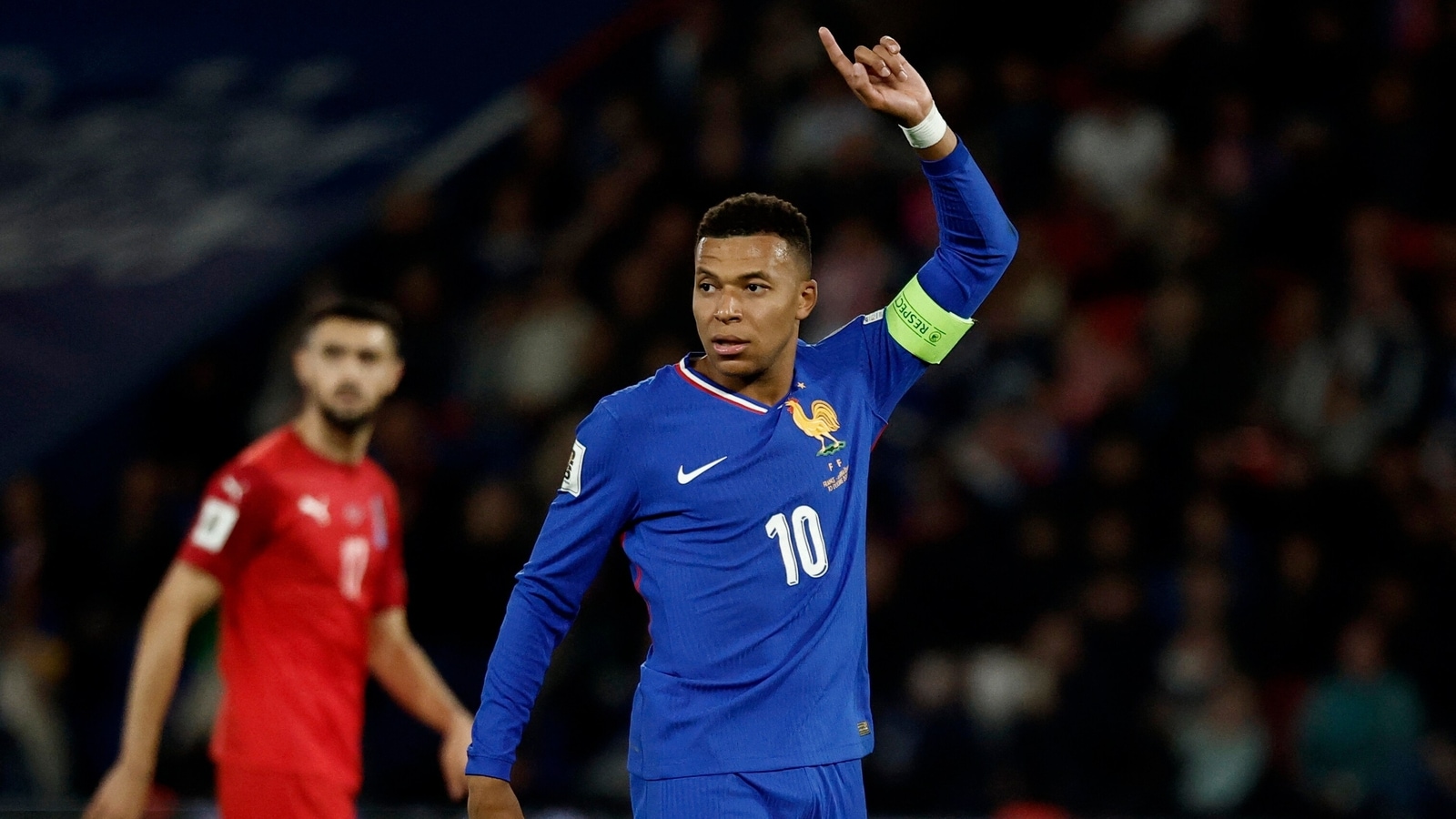 Mbappe scores but limps off late in France's World Cup qualifying win. Germany gets boost