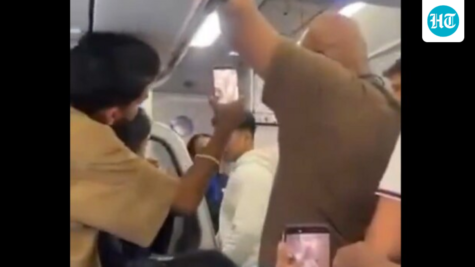Crew abused, cockpit door kicked: Video shows passengers creating ruckus onboard IndiGo flight after nine-hour delay