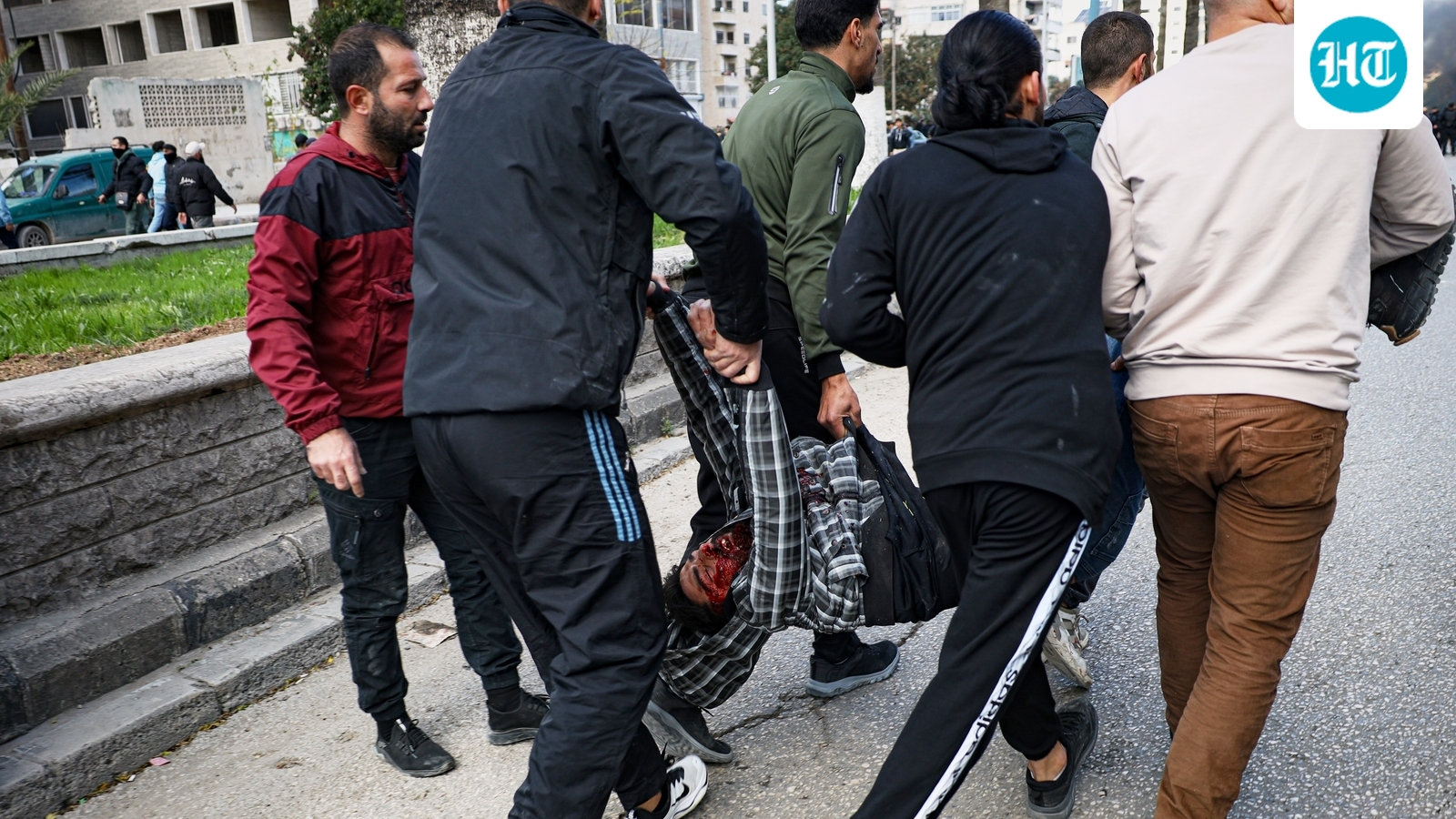 At least 3 dead as Alawites protest Homs mosque bombing that killed 8 in Syria