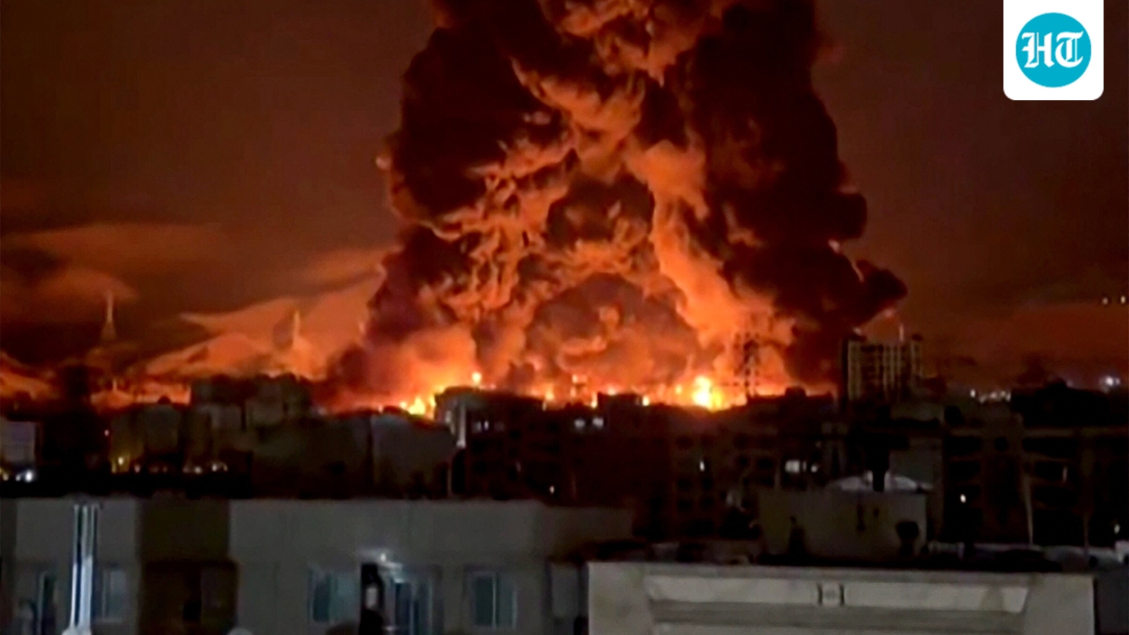 Towering fire, sun blocked, oily rain: Tehran shrouded in dark smoke as oil facilities targeted | Watch