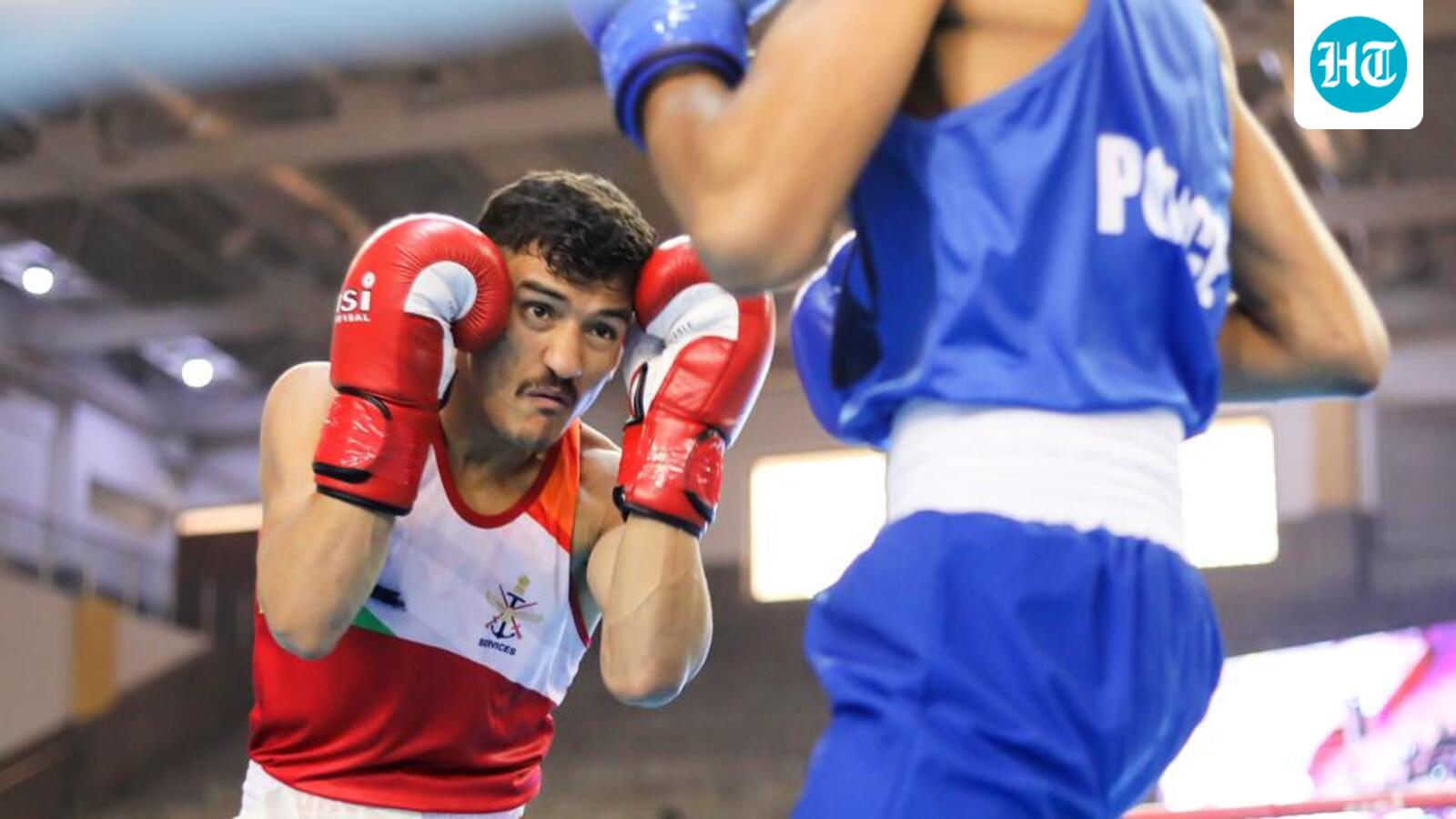 Top boxers progress, referring under fresh scrutiny
