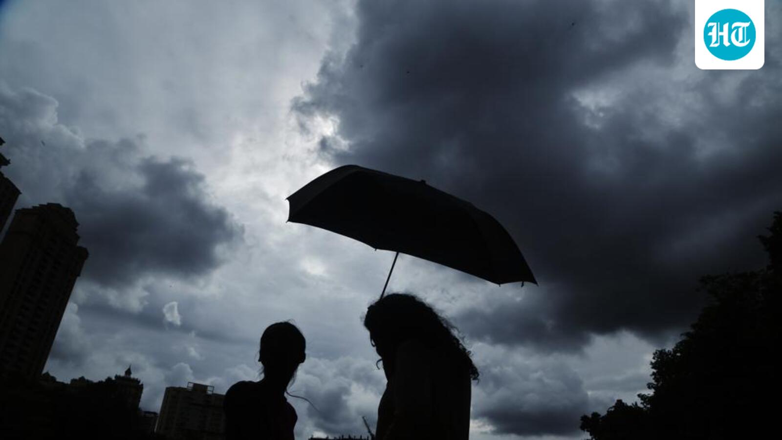 Commuters face delays as heavy rain disrupts train services in Mumbai