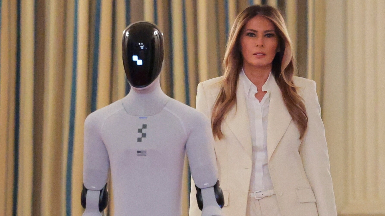 Melania Trump's appearance with ‘Figure 03’ robot ‘who speaks better English than her’ sparks buzz online