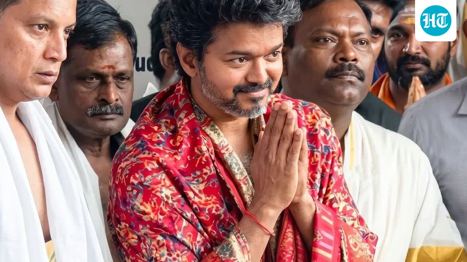 Sobbing female fan follows TN CM C Joseph Vijay's car as he drives himself after Karnataka temple visit