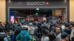 Swatch shuts stores after crowds queue for new watch
