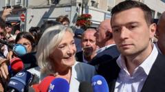 The photo that shows who's really on top in Le Pen's party