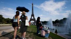 Half of France under red heat alert as alcohol banned at street music festival