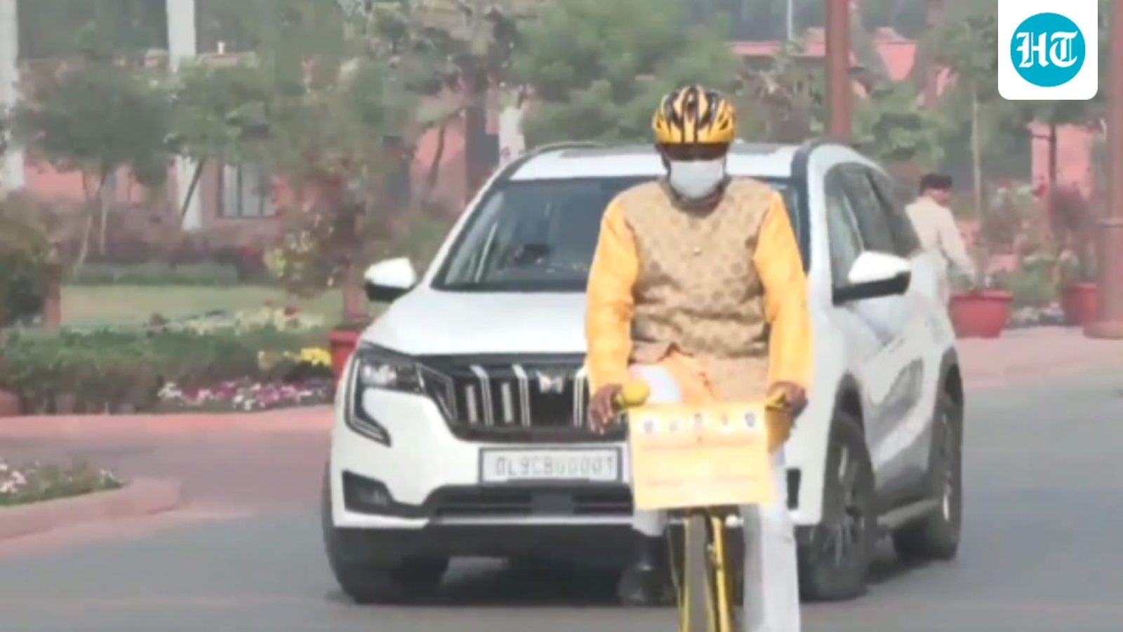 'Public is suffering due to pollution': TDP MP Kallisetti rides bicycle to Parliament wearing mask. Watch