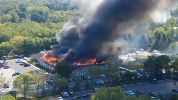 2 dead, 8 wounded in shooting and fire at Michigan church, police say