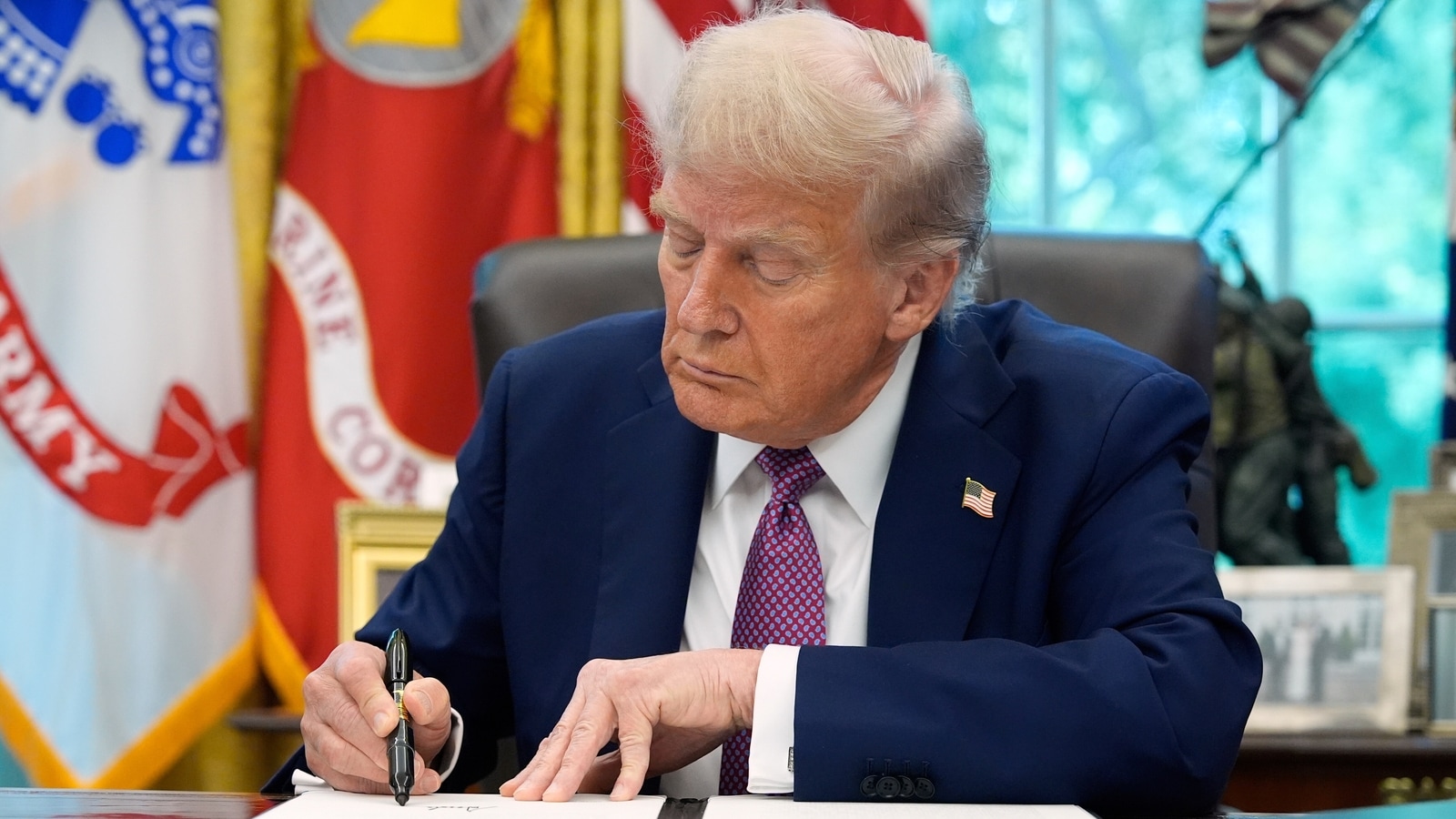 Trump calls for a 50-100% tariff on China to break Russia’s war machine