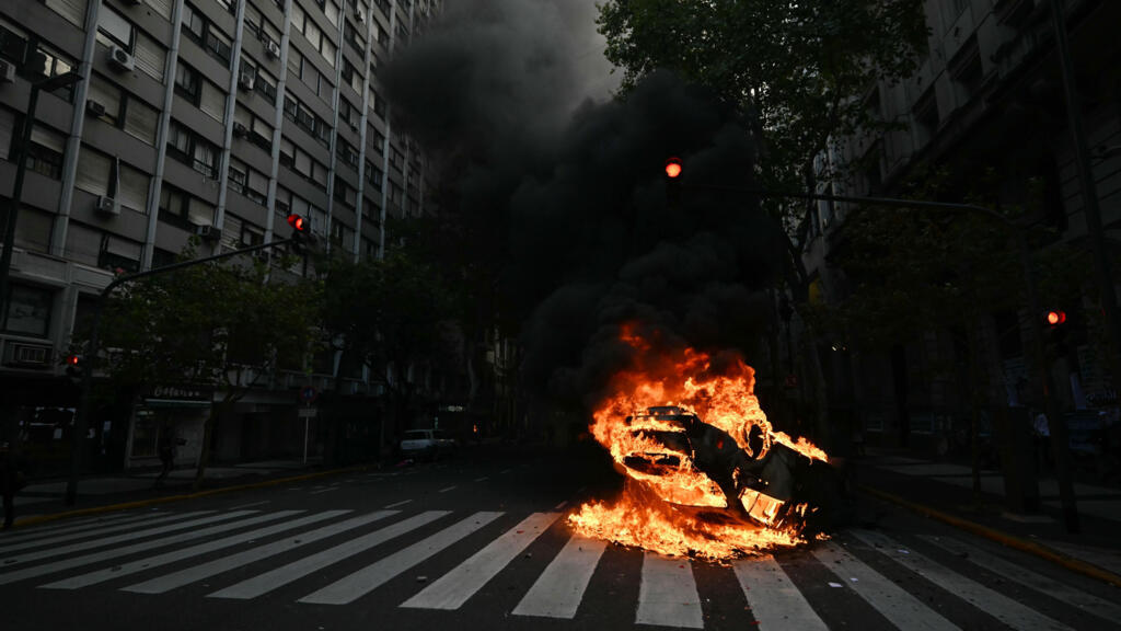 Argentine football fans clash with police at pensions march