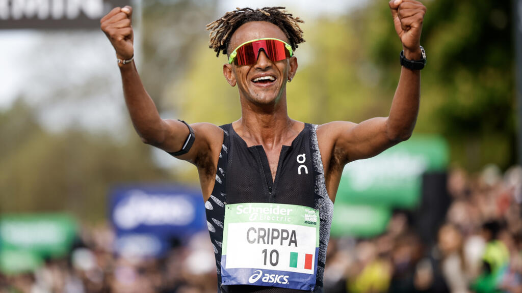 Crippa wins Paris marathon as Ethiopia's Demise sets new women's record