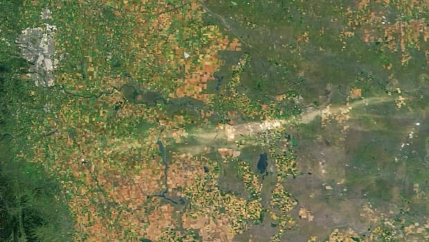 Hail, wind left 200-km 'scar' across Alberta that's visible from space