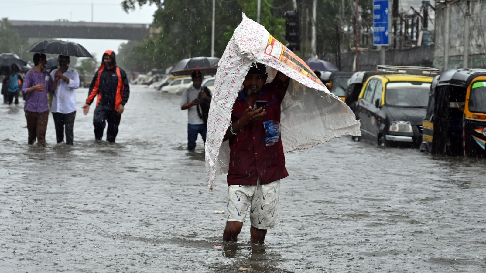 Mumbai rain live updates: Severe waterlogging hits city after downpour; IMD issues red alert