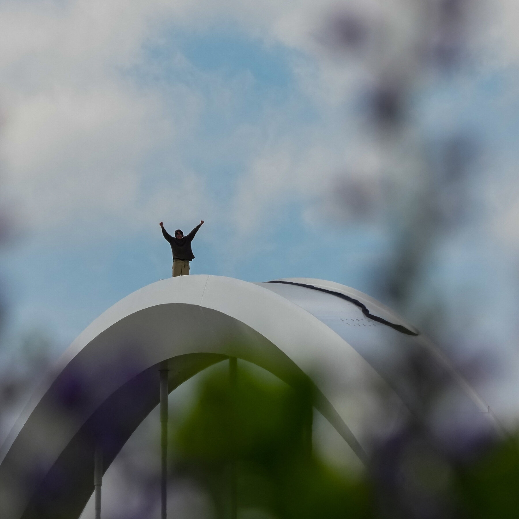 A Solitary Protester on Top of the Frederick Douglass Memorial Bridge in D.C.