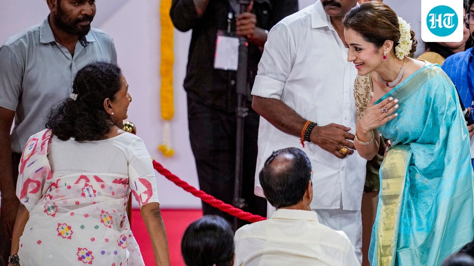 Trisha Krishnan greets Vijay's mother at the oath ceremony of his becoming new Tamil Nadu Chief Minister