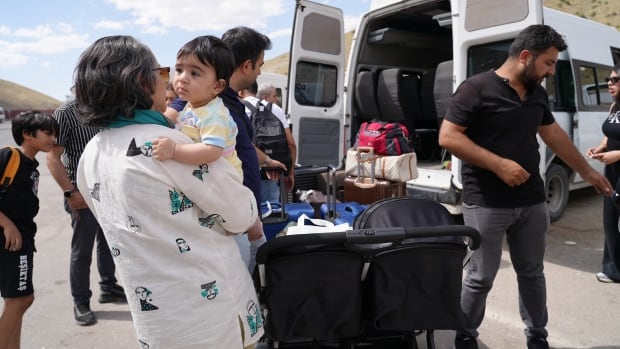 As airstrikes intensify, Iranians are flocking to the borders