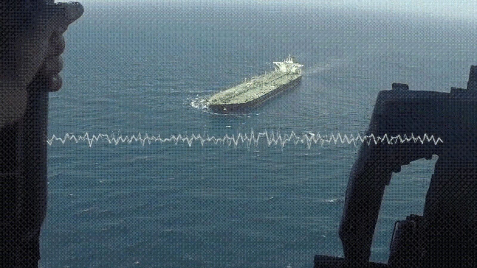 Watch: US Central Command releases footage of navy redirecting ship amid Hormuz blockade as Iran war stalemate persists