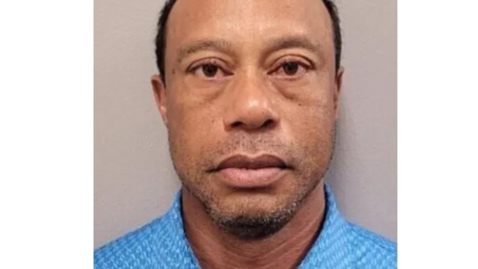 Is Tiger Woods profiting from his latest mugshot? All on ‘blue polo shirt’ after humiliating car crash